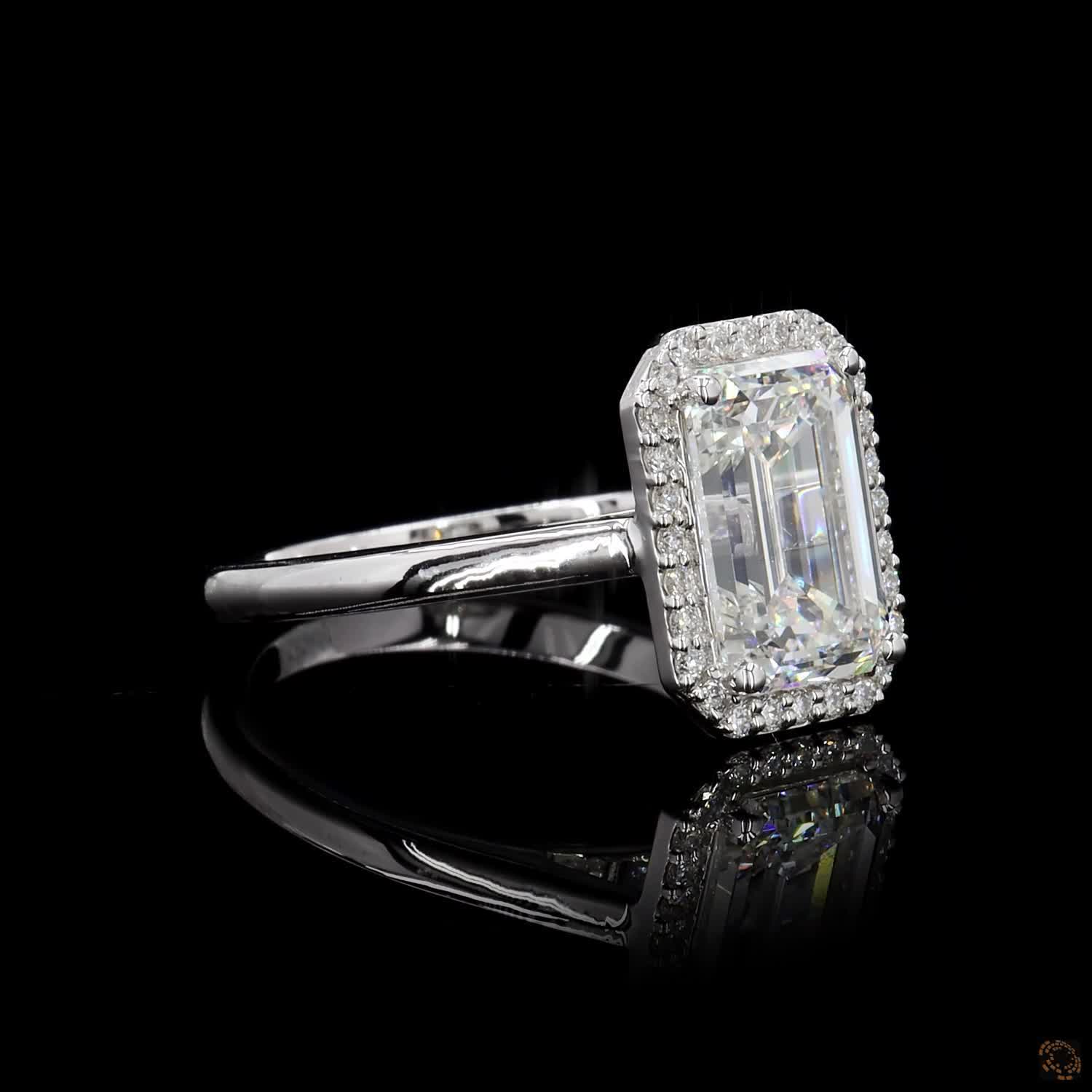 White Gold Emerald Diamond Halo Ring